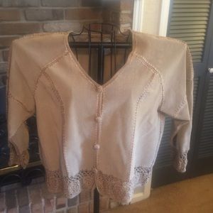 Really pretty tan little jacket.